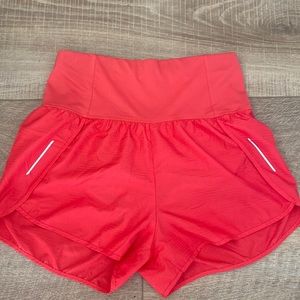 All in motion high waisted athletic showers size small- red